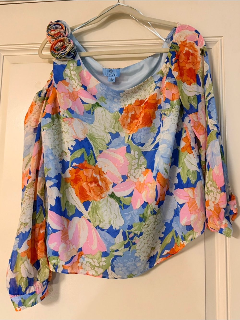 CeCe Blue Floral One-Shoulder Blouse with Rosette Accent